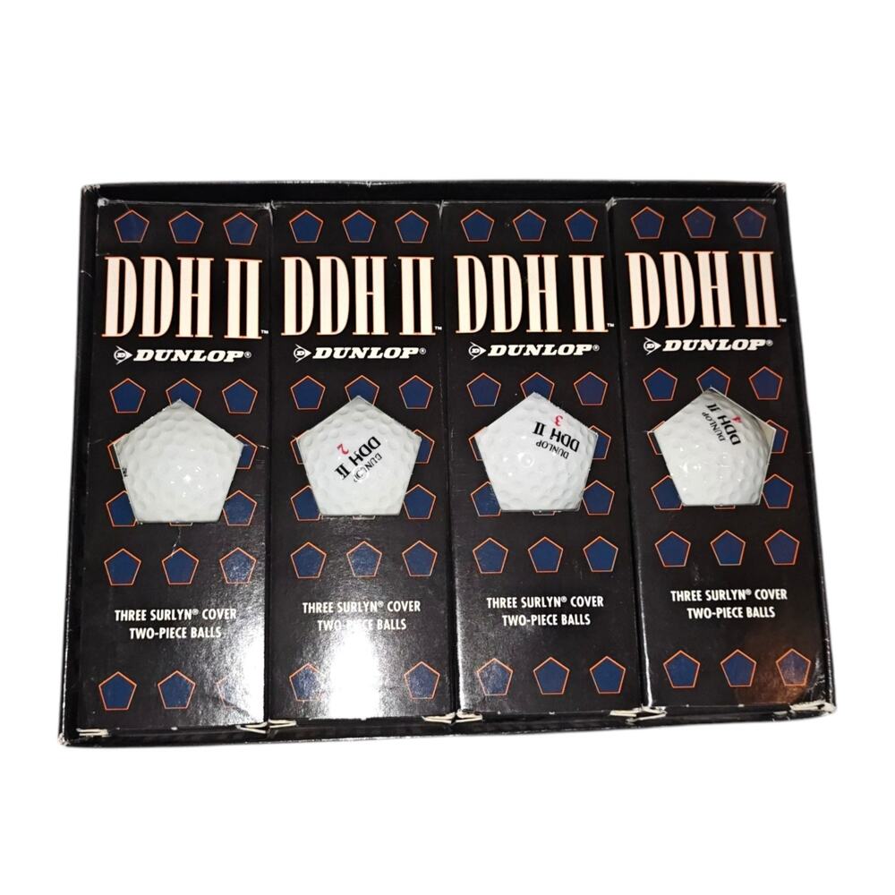vintage 8 Total Dunlop DDH II two-piece golf balls featuring a Surlyn cover